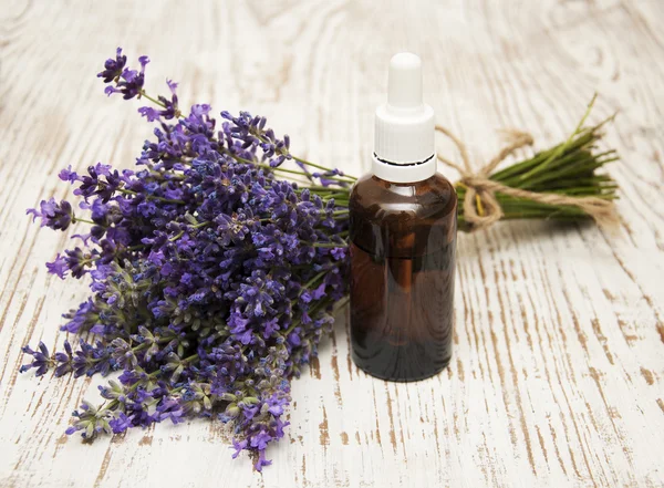 Lavender and massage oil — Stock Photo, Image